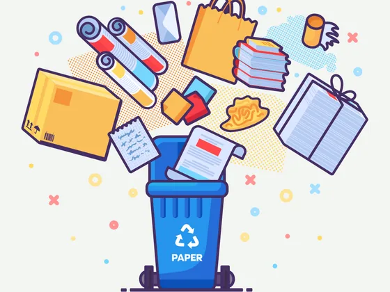 Illustration of a paper & card recycling bin with typical paper & card items being sorted into it.